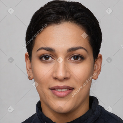 Joyful latino young-adult female with short  black hair and brown eyes