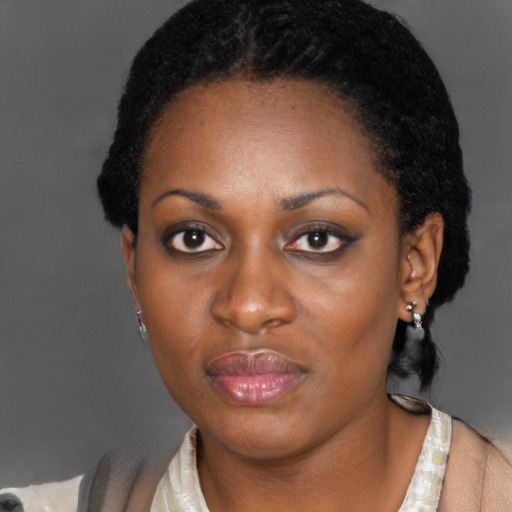 Neutral black adult female with short  black hair and brown eyes