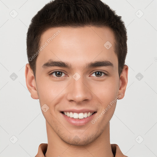 Joyful white young-adult male with short  brown hair and brown eyes