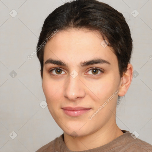 Joyful white young-adult female with short  brown hair and brown eyes