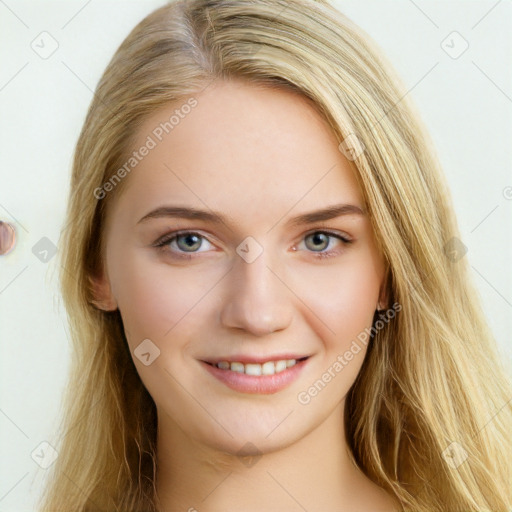 Joyful white young-adult female with long  brown hair and blue eyes