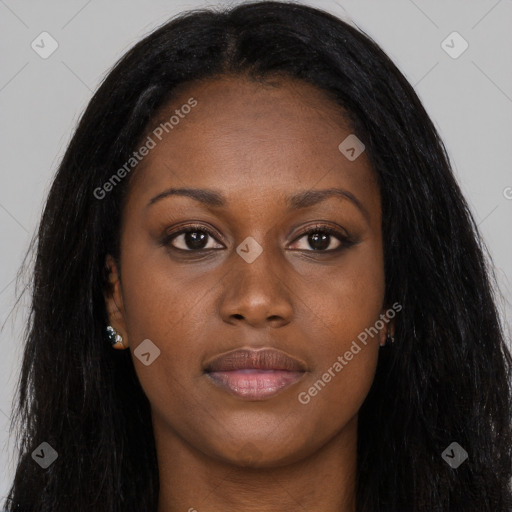 Joyful black young-adult female with long  black hair and brown eyes