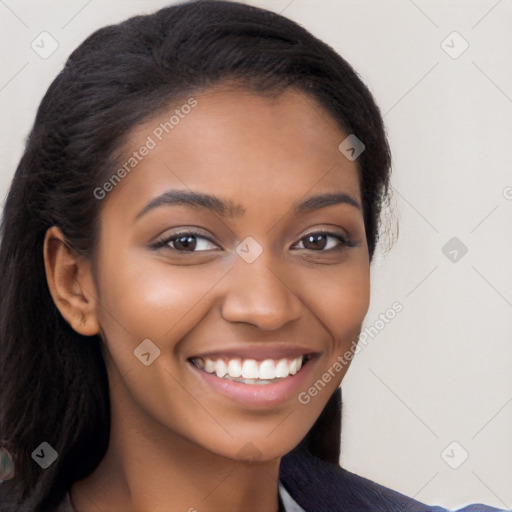 Joyful latino young-adult female with long  brown hair and brown eyes