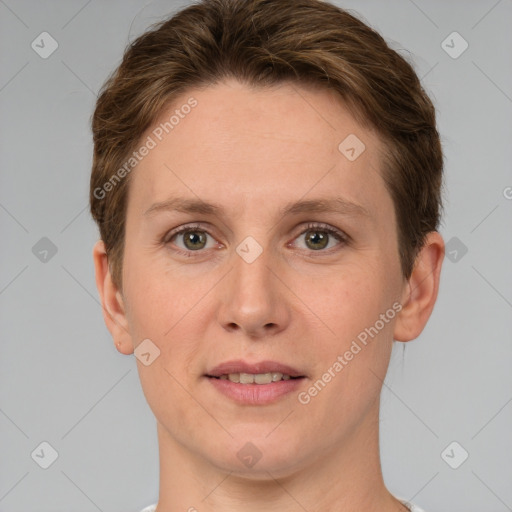 Joyful white young-adult female with short  brown hair and grey eyes