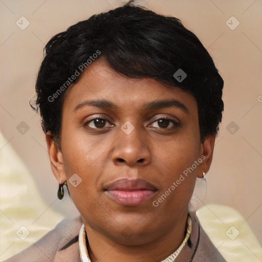 Joyful black young-adult female with short  brown hair and brown eyes