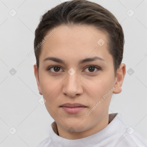 Neutral white young-adult female with short  brown hair and brown eyes