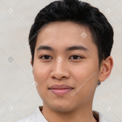 Joyful asian young-adult male with short  black hair and brown eyes