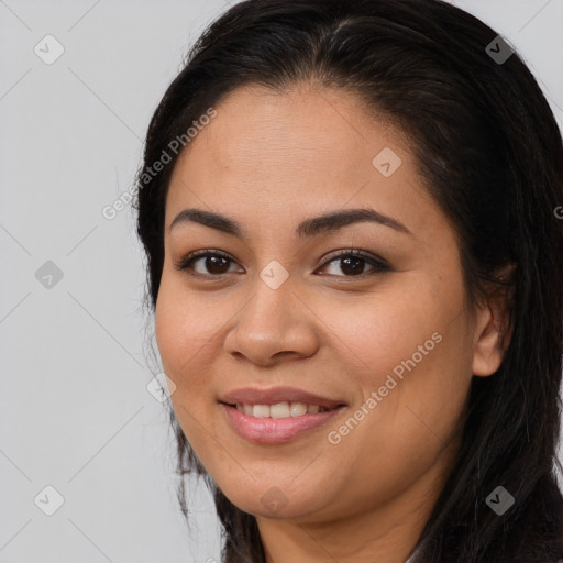 Joyful asian young-adult female with long  brown hair and brown eyes