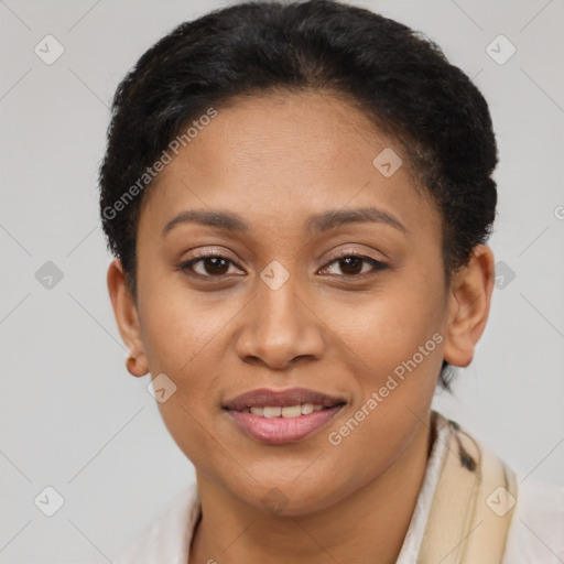 Joyful latino young-adult female with short  brown hair and brown eyes