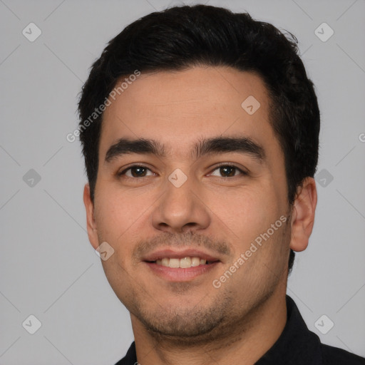 Joyful white young-adult male with short  black hair and brown eyes