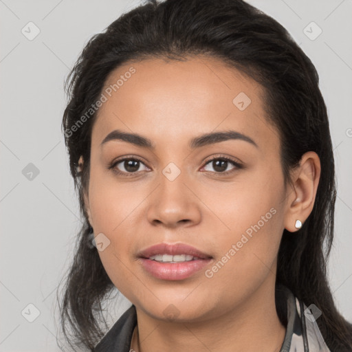 Joyful white young-adult female with long  black hair and brown eyes