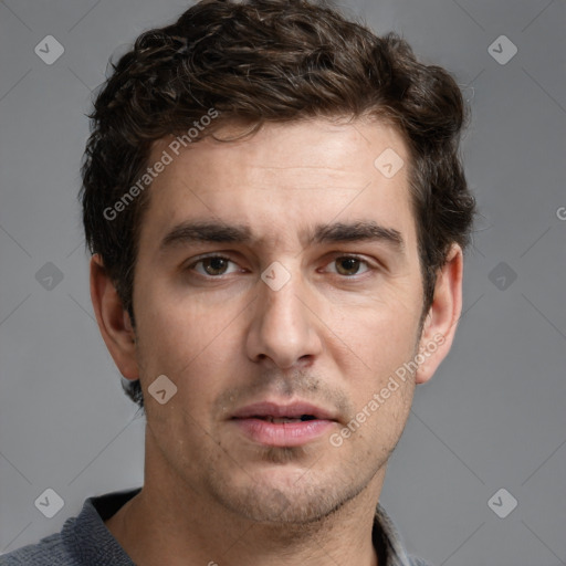 Joyful white adult male with short  brown hair and grey eyes