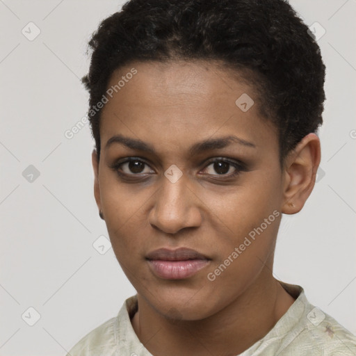 Joyful black young-adult female with short  brown hair and brown eyes