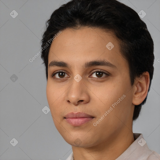 Joyful latino young-adult female with short  black hair and brown eyes