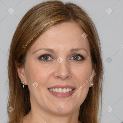 Joyful white adult female with medium  brown hair and brown eyes