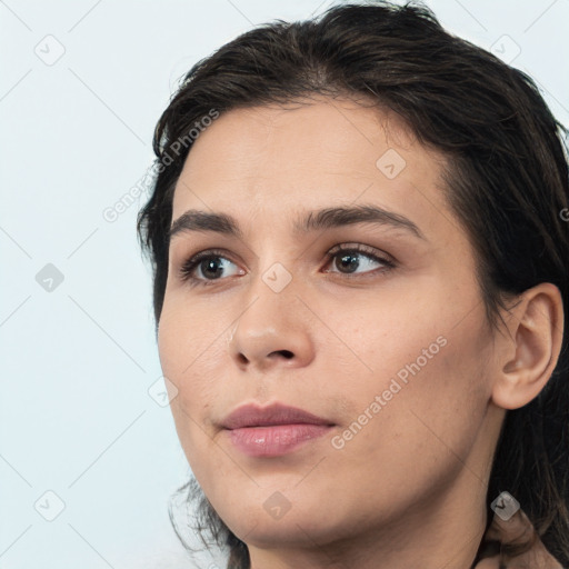 Neutral white young-adult female with medium  brown hair and brown eyes