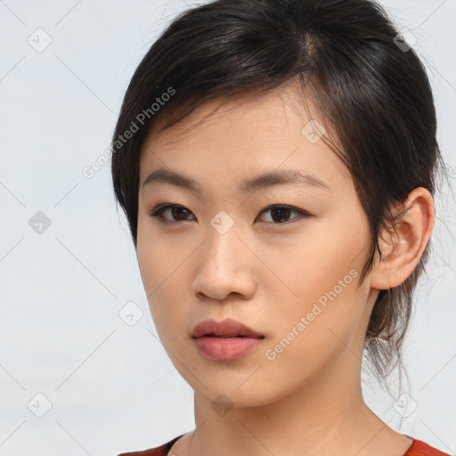 Neutral asian young-adult female with medium  brown hair and brown eyes