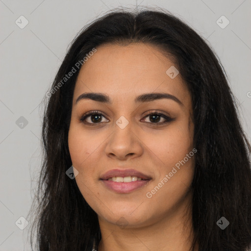 Joyful latino young-adult female with long  brown hair and brown eyes