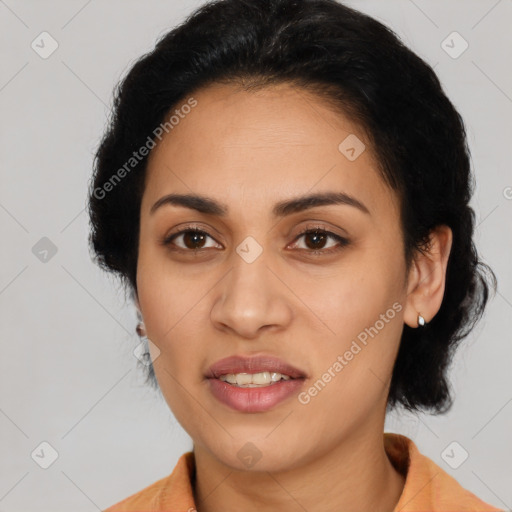 Joyful latino young-adult female with long  black hair and brown eyes