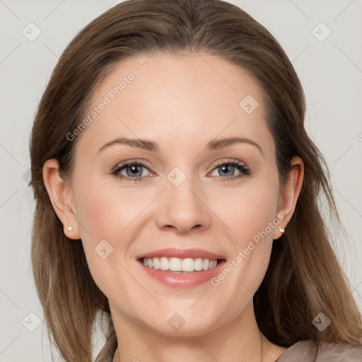 Joyful white young-adult female with long  brown hair and grey eyes