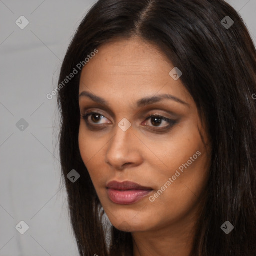 Joyful asian young-adult female with long  brown hair and brown eyes