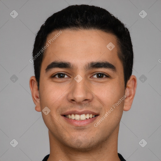 Joyful white young-adult male with short  black hair and brown eyes