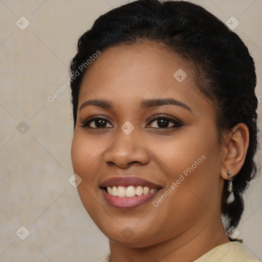 Joyful latino young-adult female with long  brown hair and brown eyes