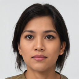 Neutral asian young-adult female with medium  black hair and brown eyes