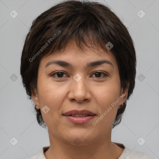 Joyful asian young-adult female with short  brown hair and brown eyes