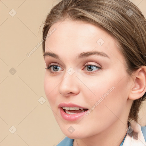 Joyful white young-adult female with long  brown hair and blue eyes