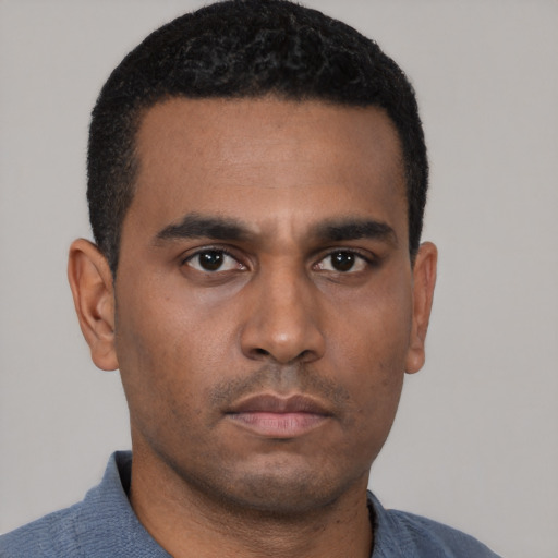Neutral black young-adult male with short  black hair and brown eyes