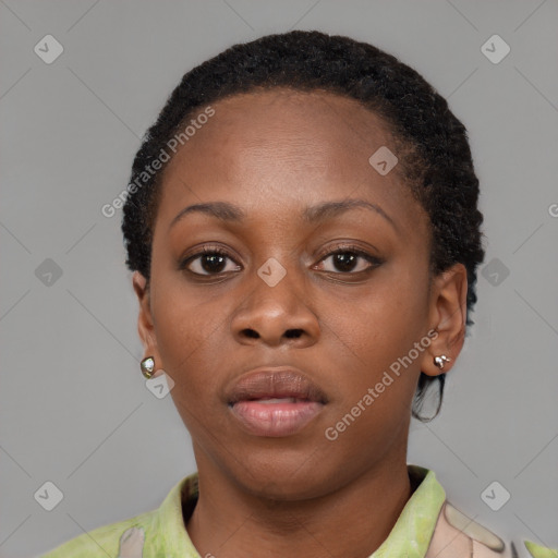 Neutral black young-adult female with short  brown hair and brown eyes