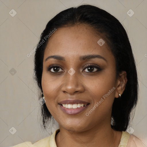 Joyful black young-adult female with medium  black hair and brown eyes