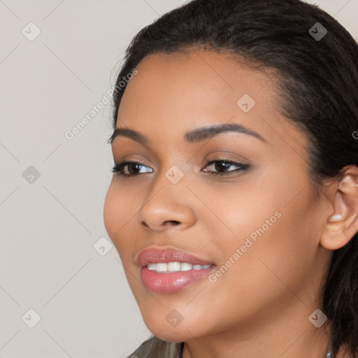 Joyful latino young-adult female with long  brown hair and brown eyes