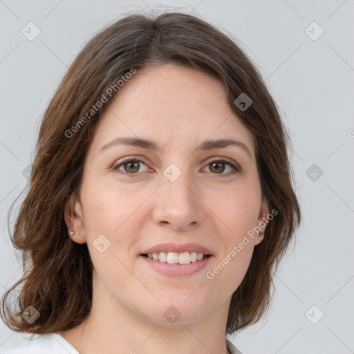 Joyful white young-adult female with medium  brown hair and green eyes