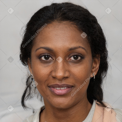 Joyful black adult female with medium  brown hair and brown eyes