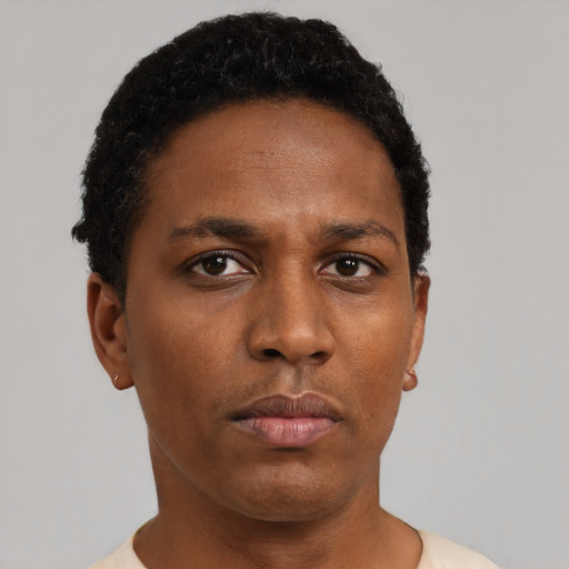 Neutral black adult female with short  black hair and brown eyes