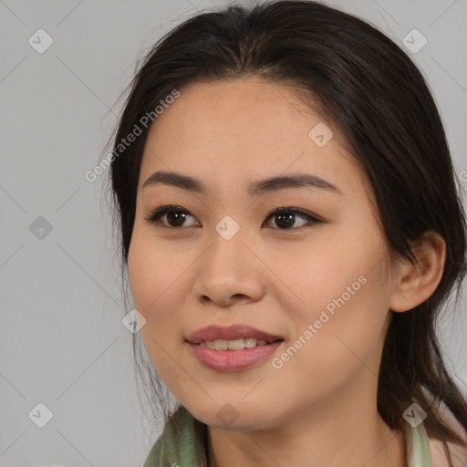 Joyful asian young-adult female with medium  brown hair and brown eyes