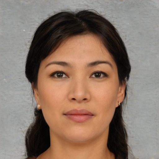 Neutral asian young-adult female with medium  brown hair and brown eyes