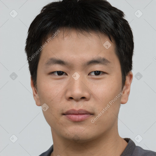 Neutral asian young-adult male with short  black hair and brown eyes