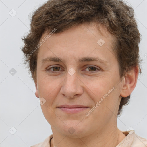 Joyful white adult female with short  brown hair and brown eyes