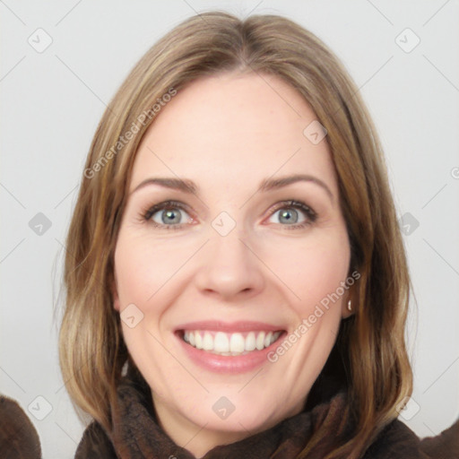 Joyful white young-adult female with medium  brown hair and blue eyes