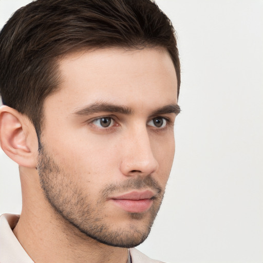 Neutral white young-adult male with short  brown hair and brown eyes