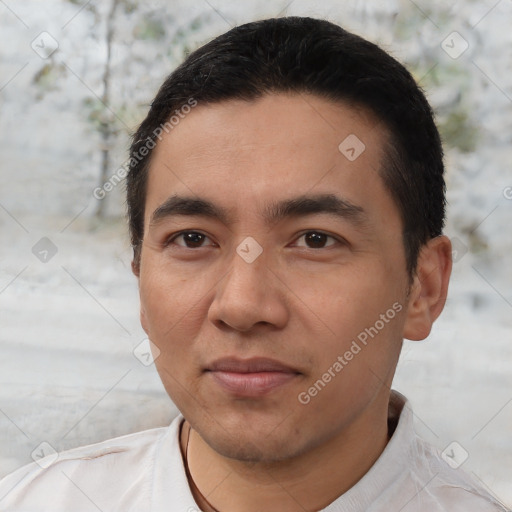 Joyful white young-adult male with short  black hair and brown eyes