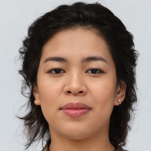 Joyful asian young-adult female with medium  brown hair and brown eyes