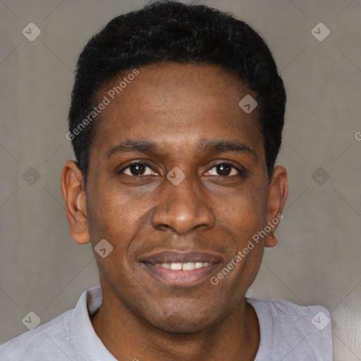 Joyful black young-adult male with short  black hair and brown eyes