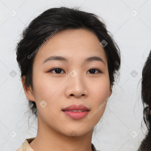 Joyful asian young-adult female with medium  black hair and brown eyes