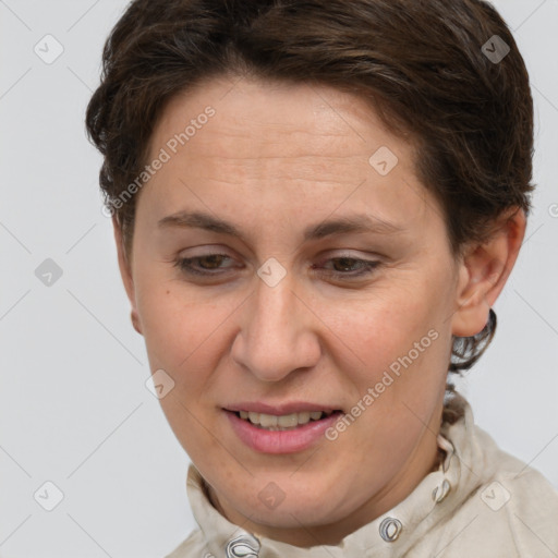 Joyful white adult female with short  brown hair and brown eyes