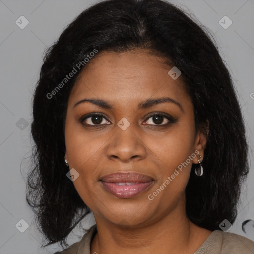 Joyful black young-adult female with medium  brown hair and brown eyes