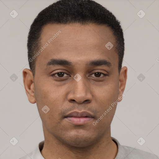 Neutral latino young-adult male with short  black hair and brown eyes